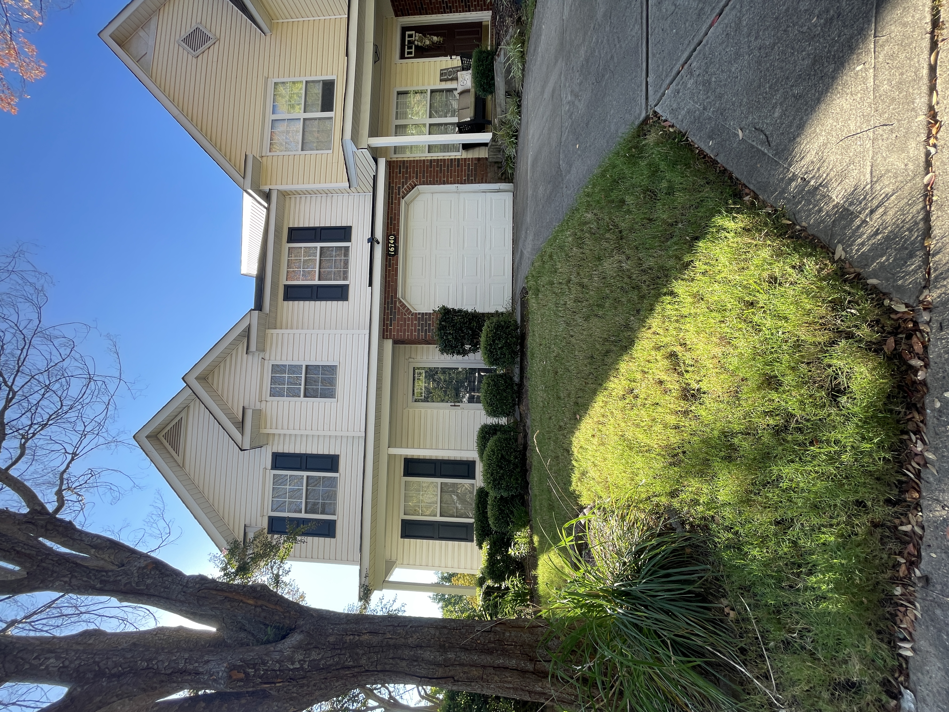 Townhouse with bedroom suite on main level and 1 car garage
